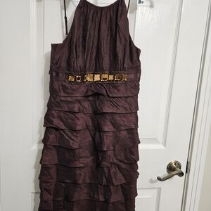 Elegant Brown Sleeveless Dress with Gold Accents